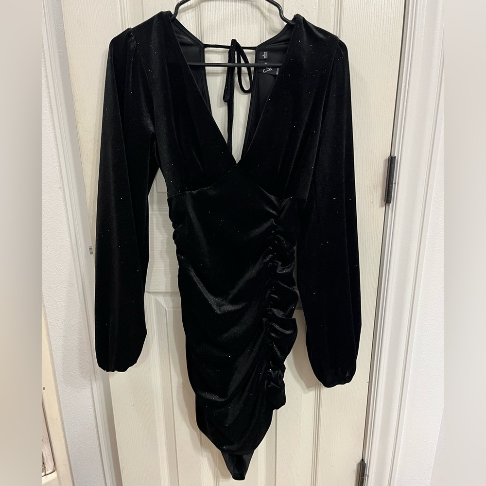 Black dress super cute has sparkle to it